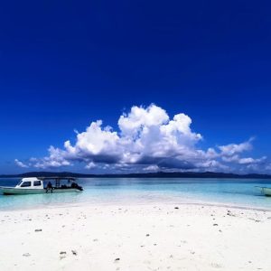 Dive into Raja white sand beach | Infinite Blue Dive Travel